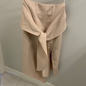 Peach skirt with front slit and front tie